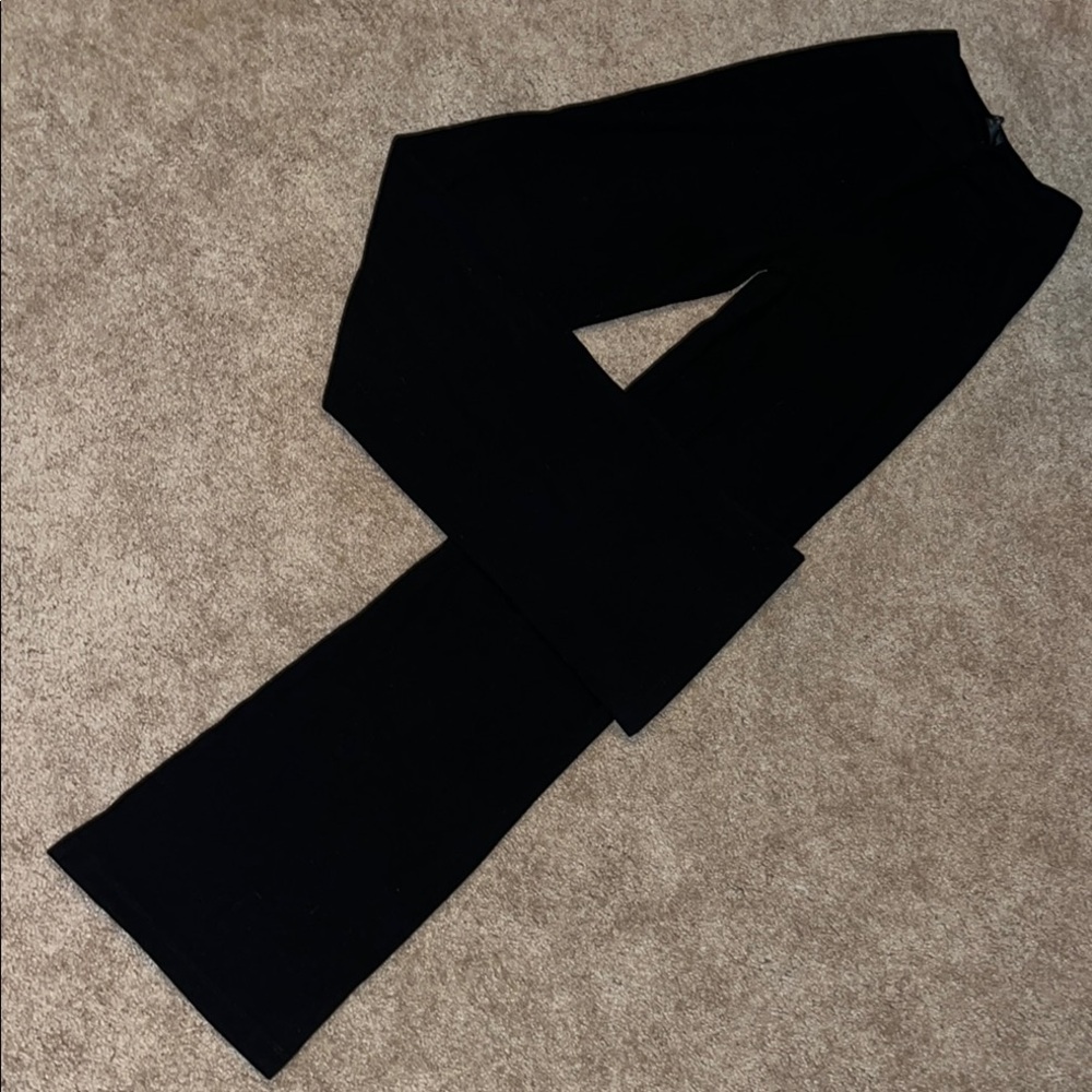 White fox trust yourself, black pants.